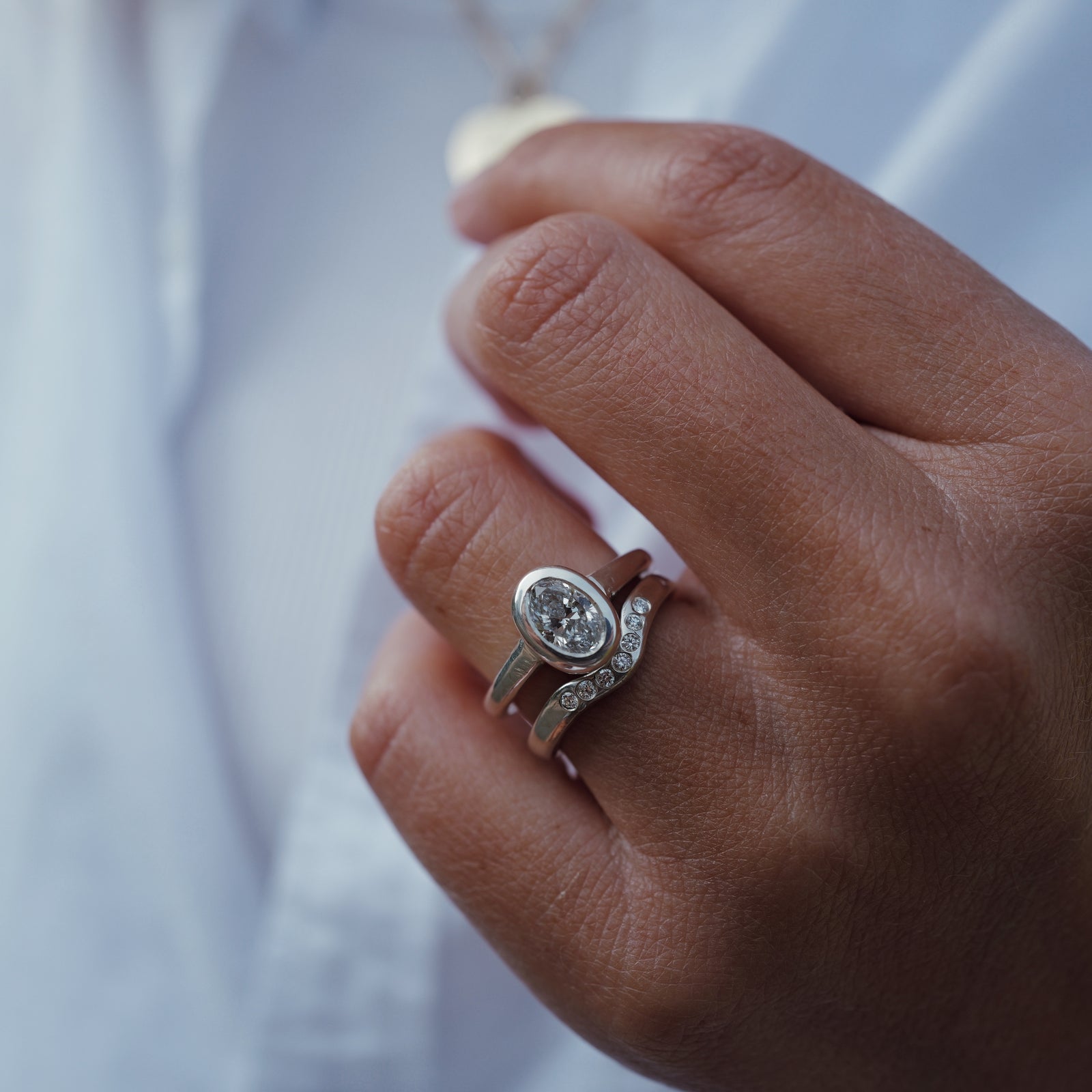 'The Story' Platinum Oval 1ct Natural Diamond Bezel Engagement Ring