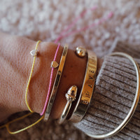 [women][modelwears Pink & Yellow Cord Bracelet]