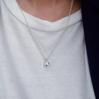 Silver DD Tennis Ball Necklace