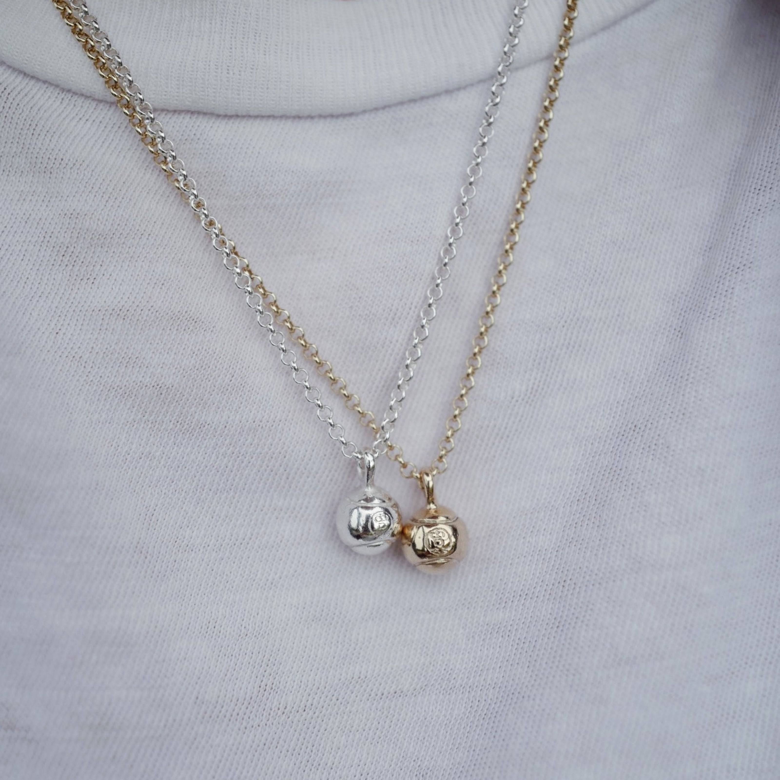 Silver DD Tennis Ball Necklace