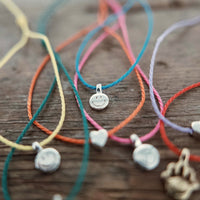 Silver Smiley Face Cord Bracelet