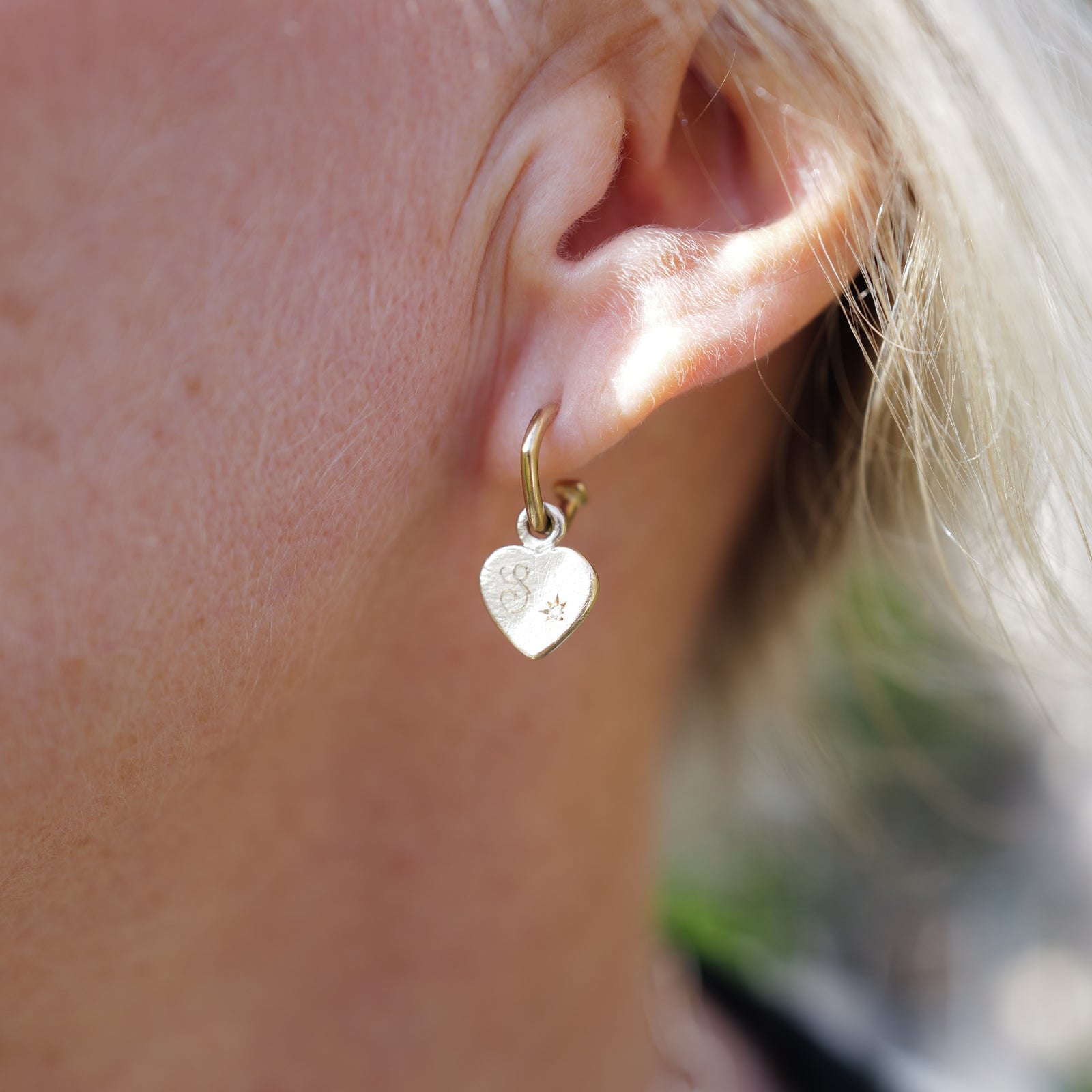 [modelwears Gold Tiny Cupid Hoop Earrings]