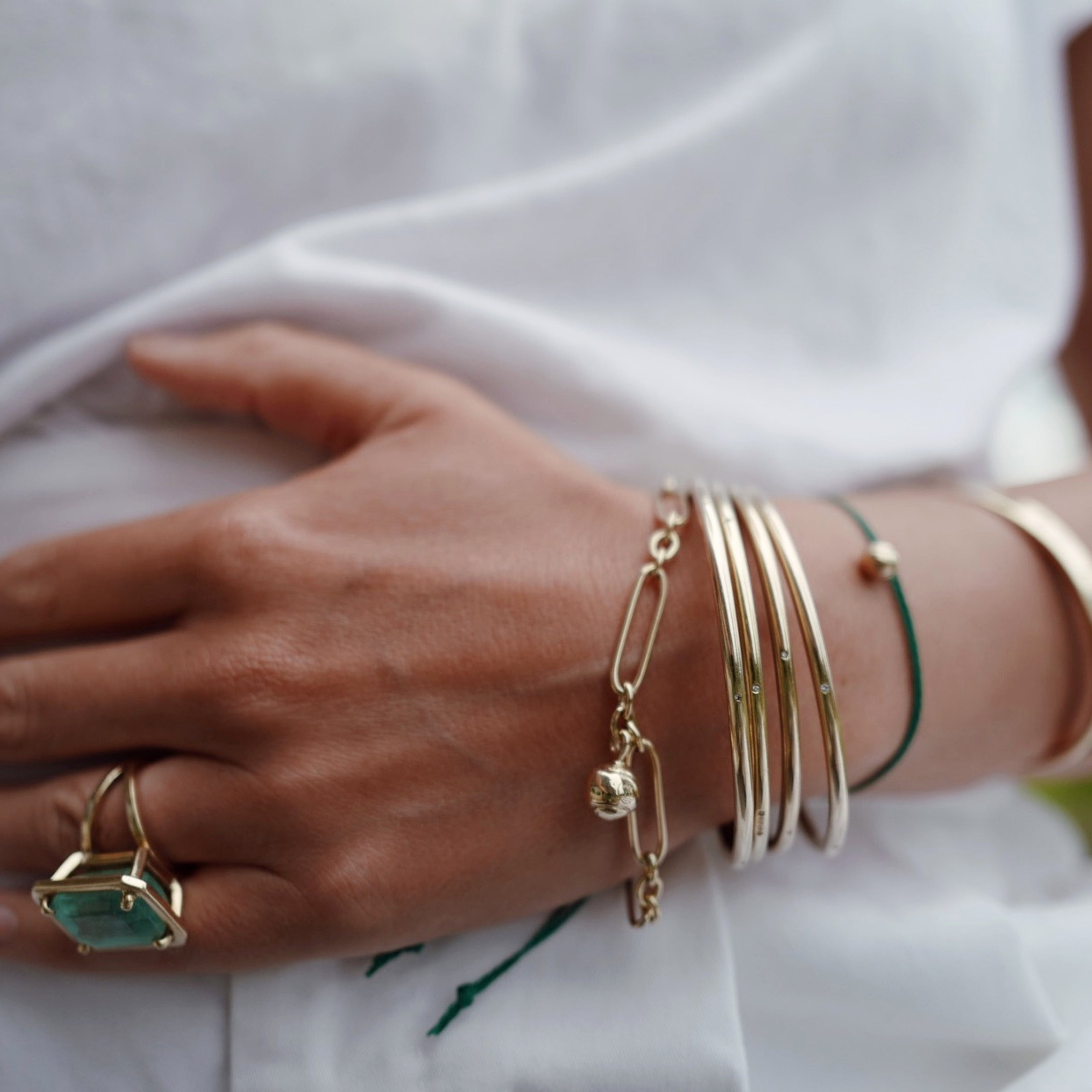 Gold DD Tennis Ball Chain Bracelet