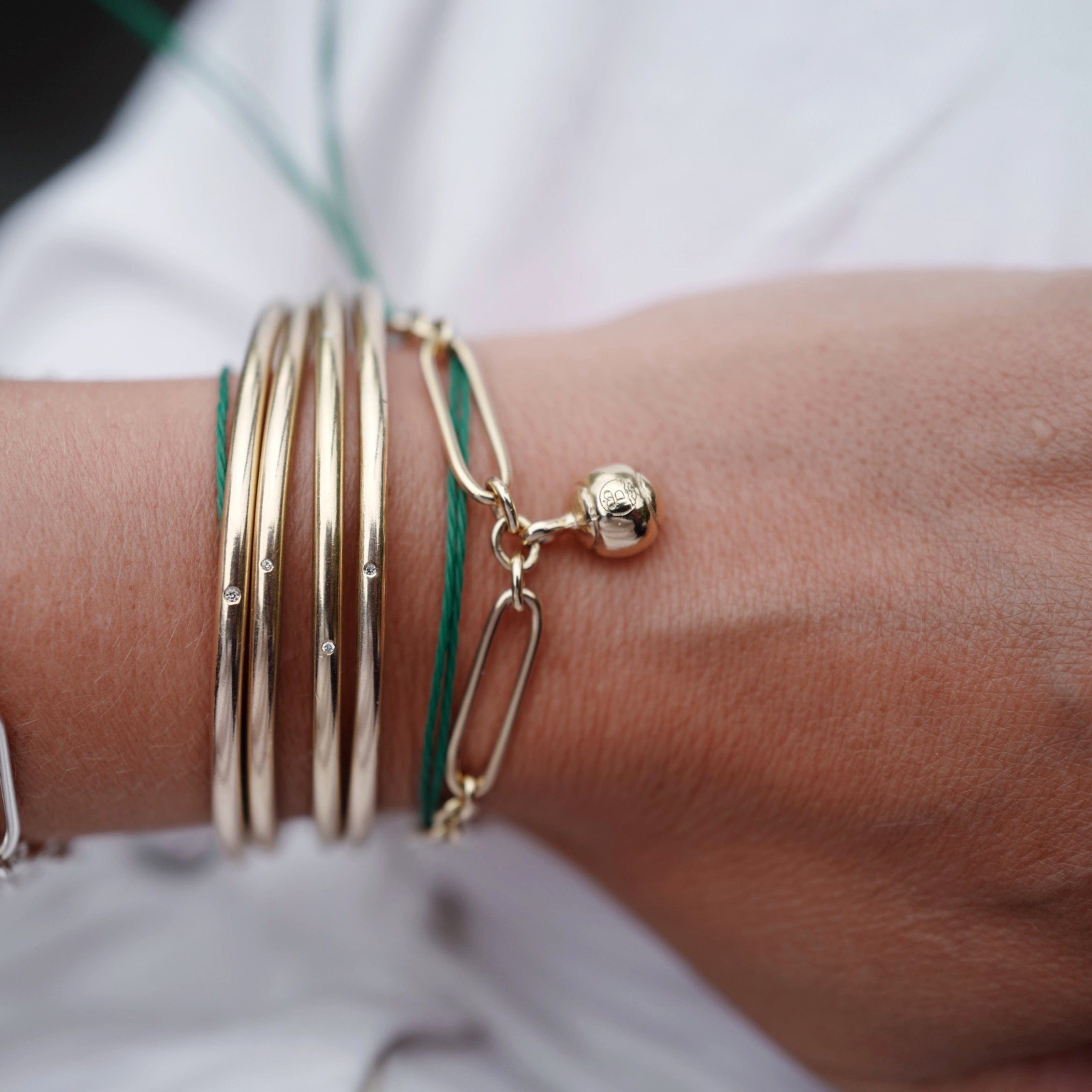 Gold DD Tennis Ball Chain Bracelet