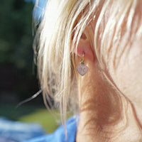 [modelwears Gold Tiny Cupid Hoop Earrings]