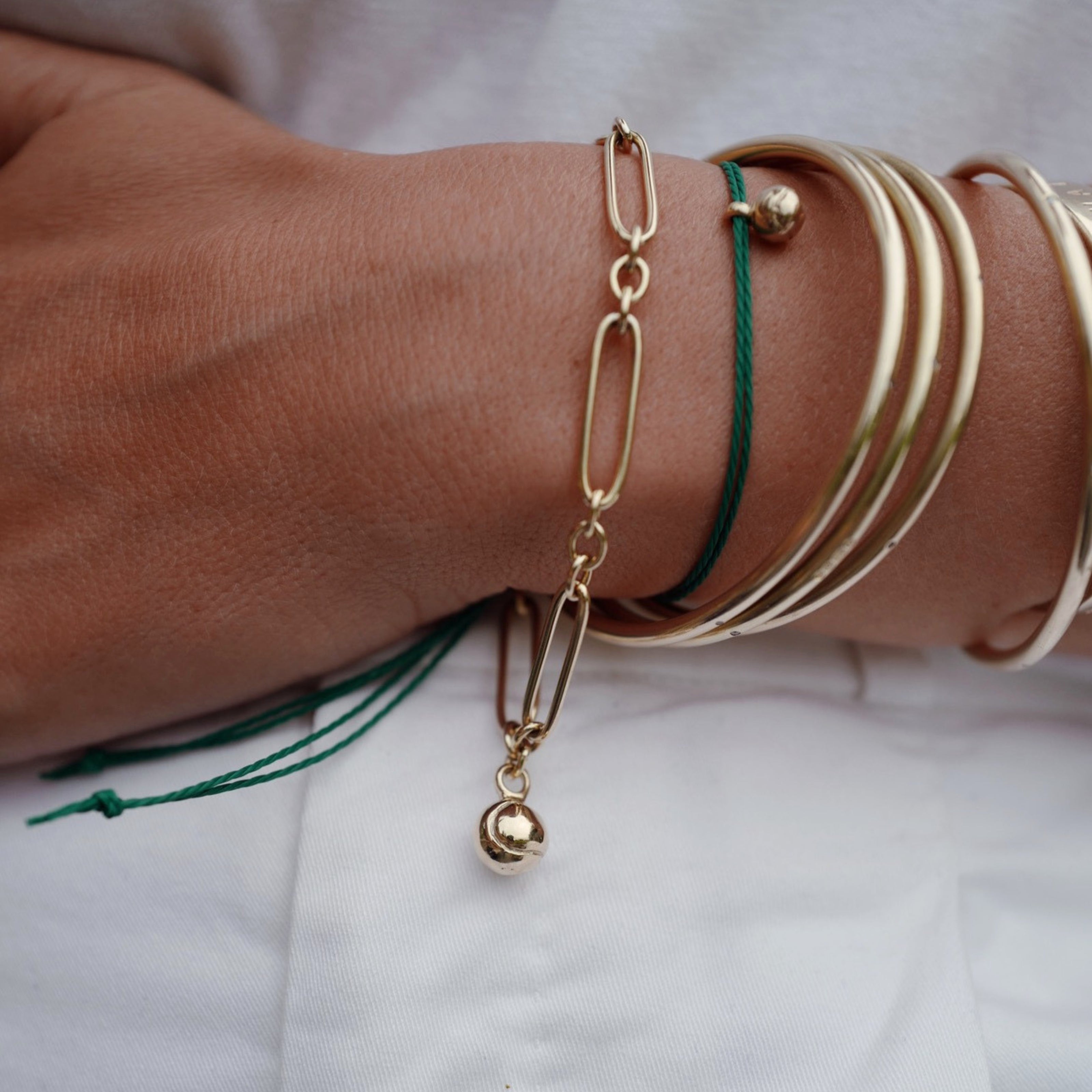 Gold DD Tennis Ball Chain Bracelet