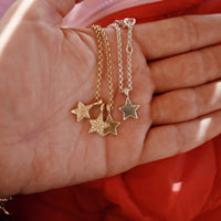 [modelwears Gold Pave Trio Guiding Star Necklace with Hand Engraving]