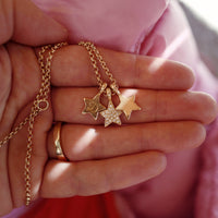 [modelwears Gold Pave Trio Guiding Star Necklace with Hand Engraving]