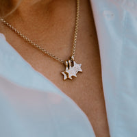 [modelwears Gold Two Diamond Trio Guiding Star Necklace with Hand Engraving]