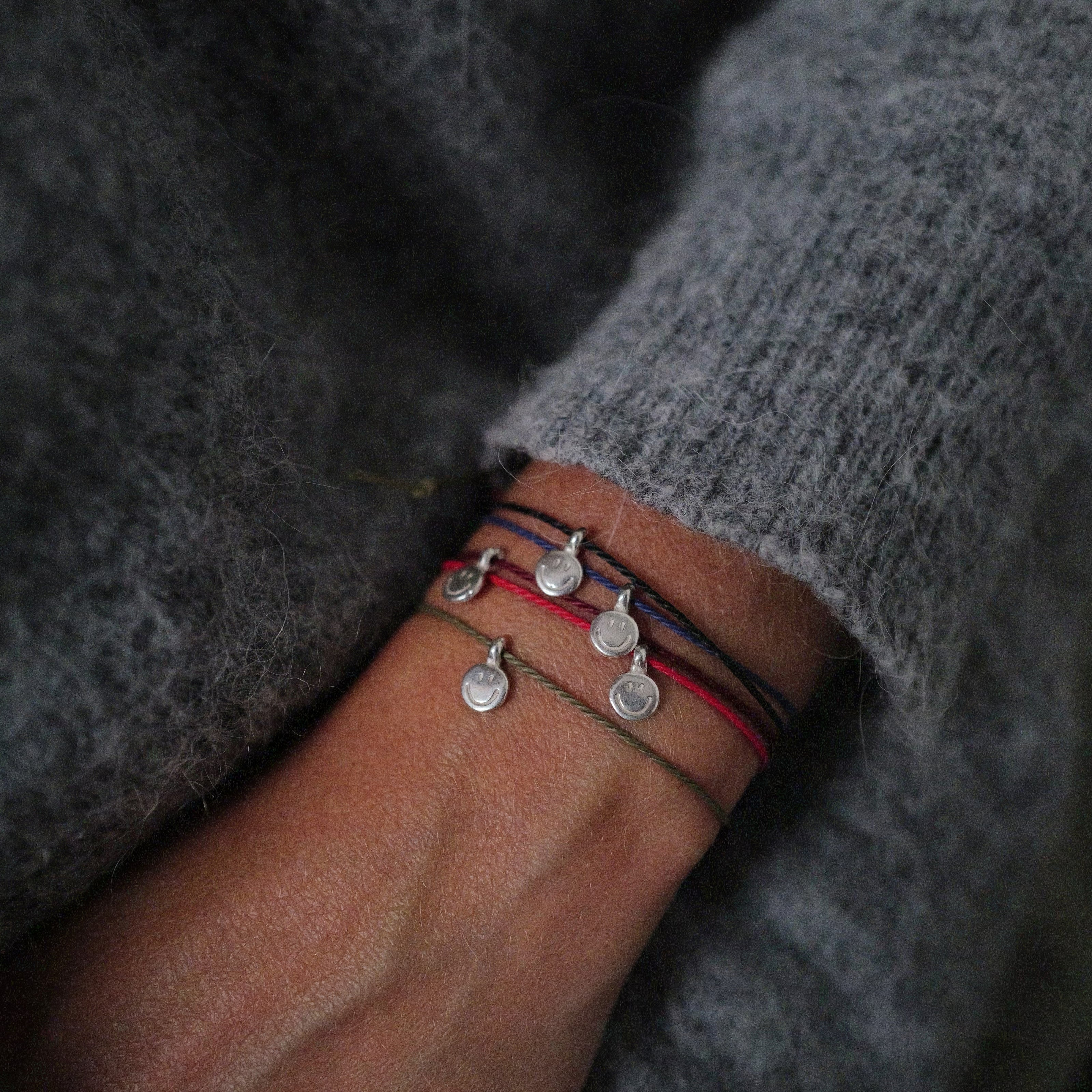 Silver Smiley Face Cord Bracelet