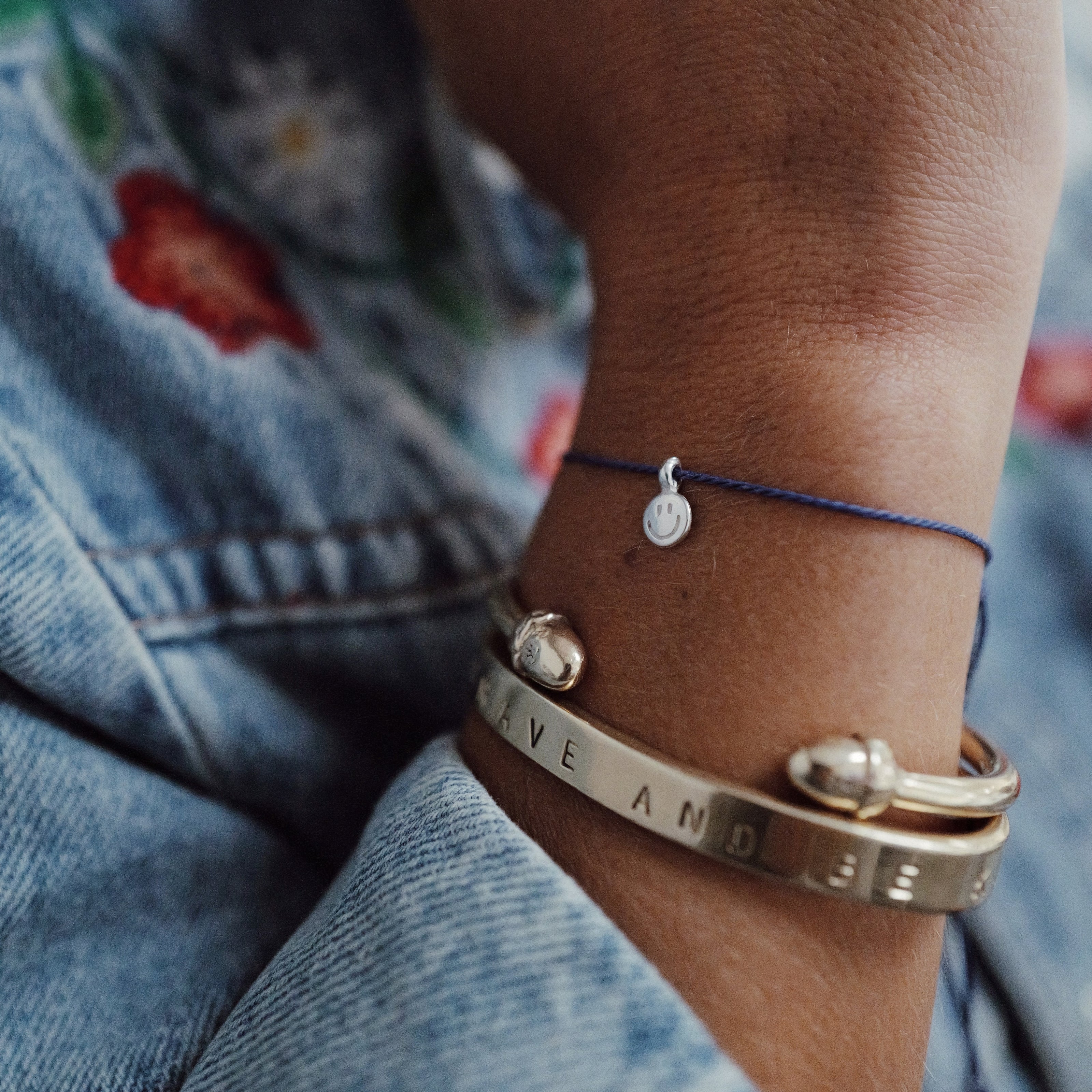 Silver Smiley Face Cord Bracelet