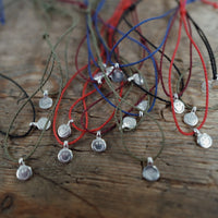 Silver Smiley Face Cord Bracelet