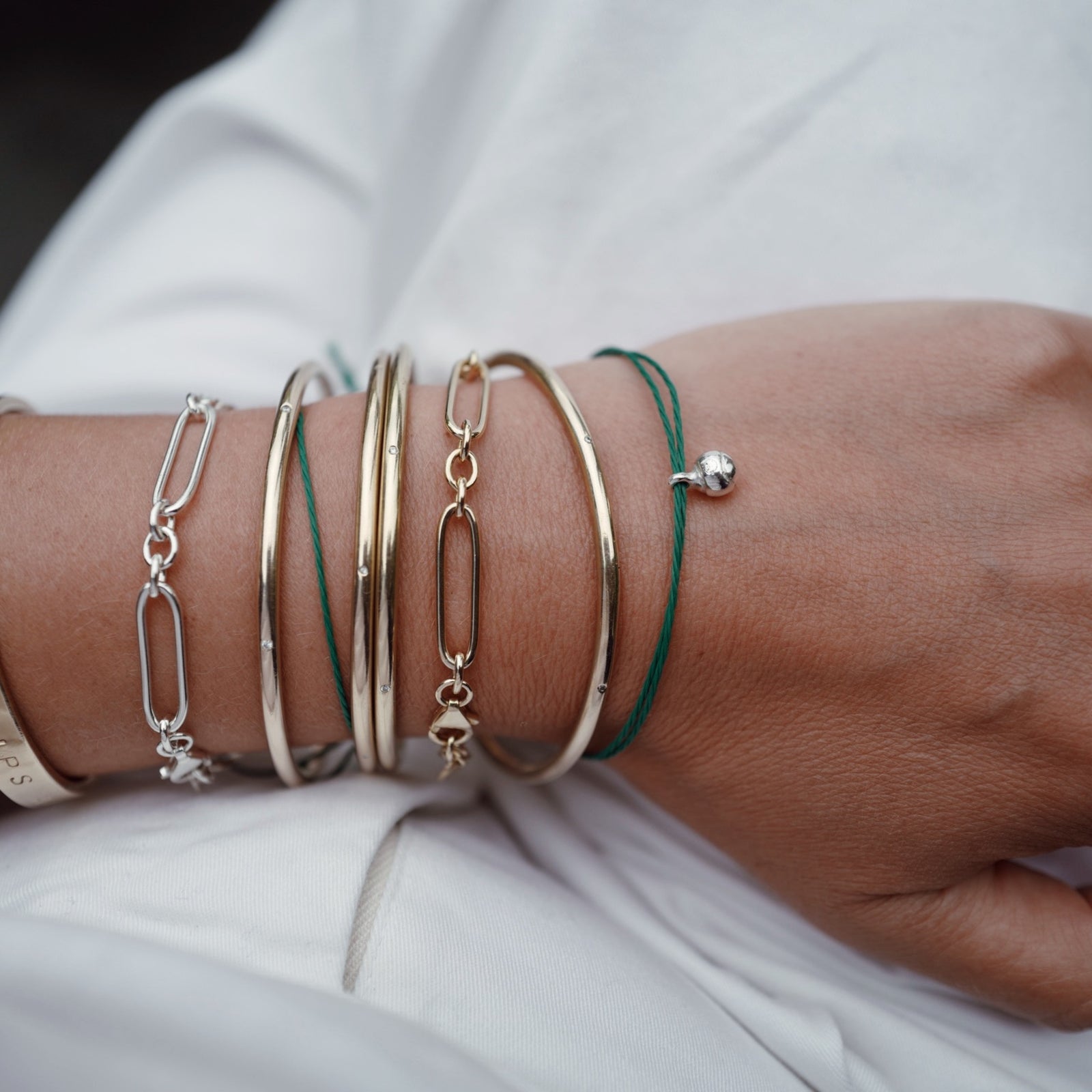 Silver DD Tennis Ball Cord Bracelet