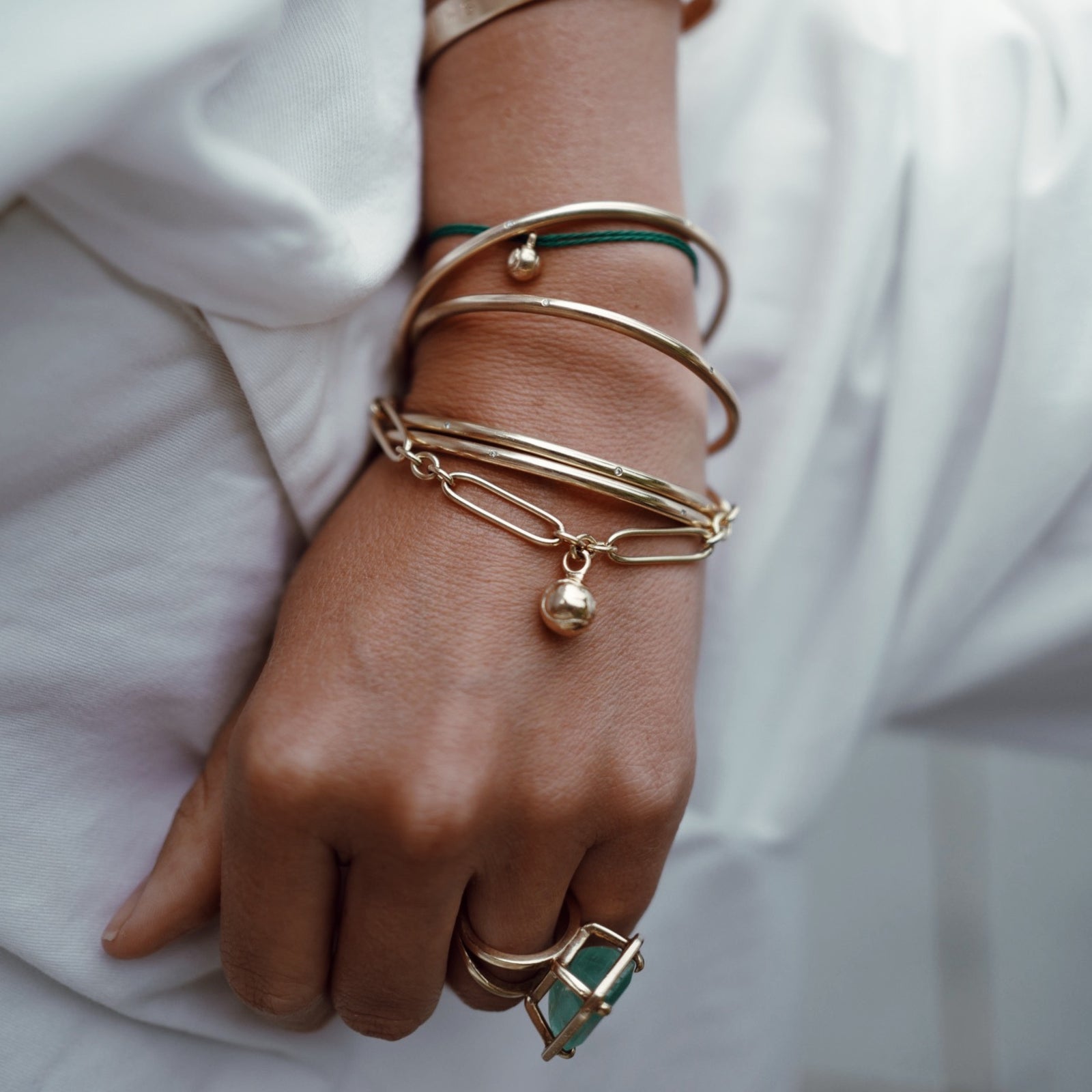 Gold DD Tennis Ball Cord Bracelet