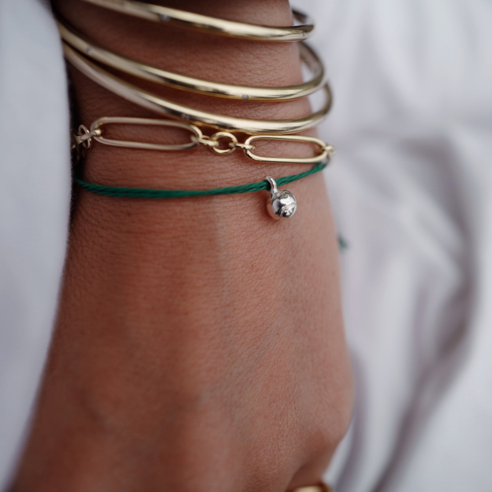 Silver DD Tennis Ball Cord Bracelet