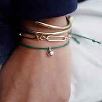 Silver DD Tennis Ball Cord Bracelet