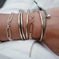 Silver DD Tennis Ball Cord Bracelet