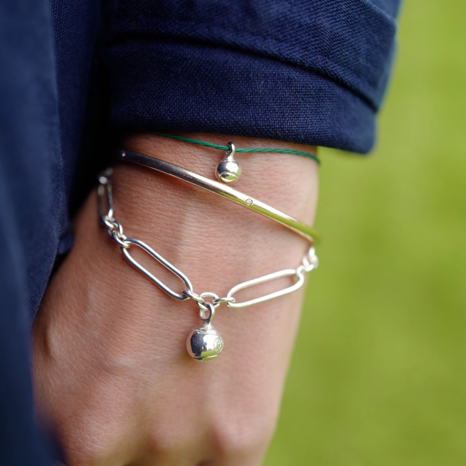 Silver DD Tennis Ball Cord Bracelet