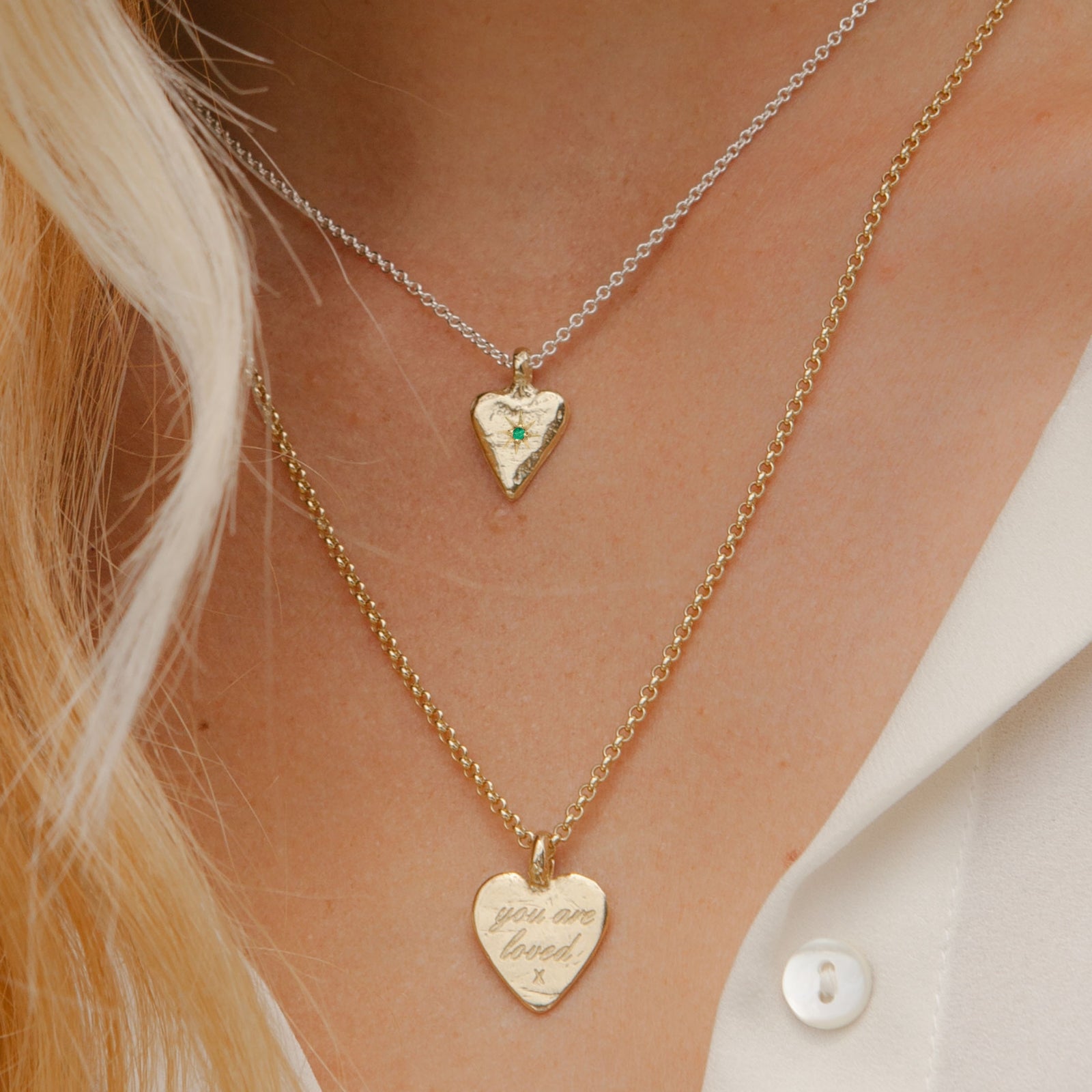 [modelwears Silver & Gold Mini Heart Necklace with Emerald Stone]