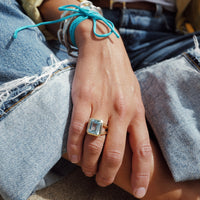 Gold Juno Blue Topaz Split Shank Ring