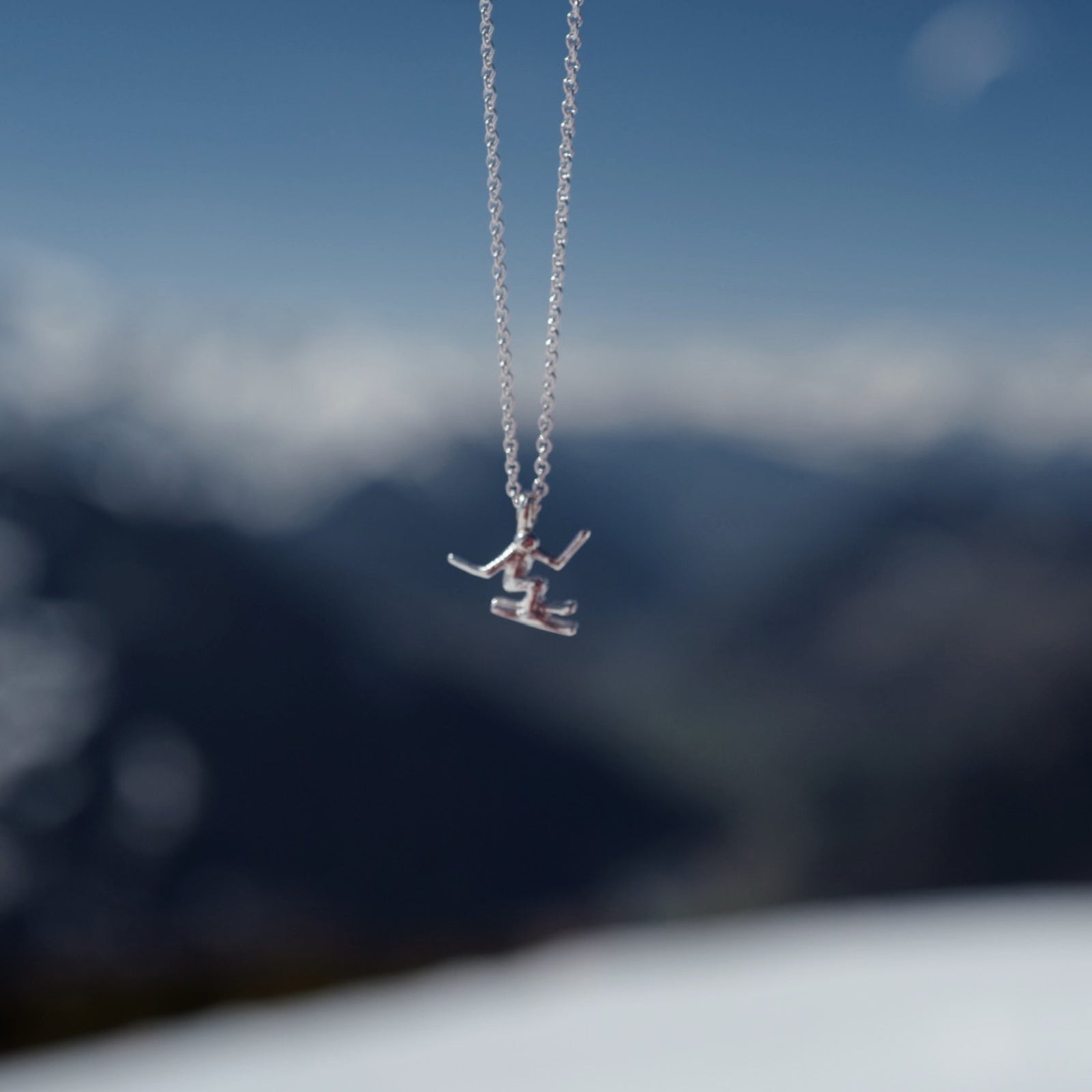 Silver Skier Necklace