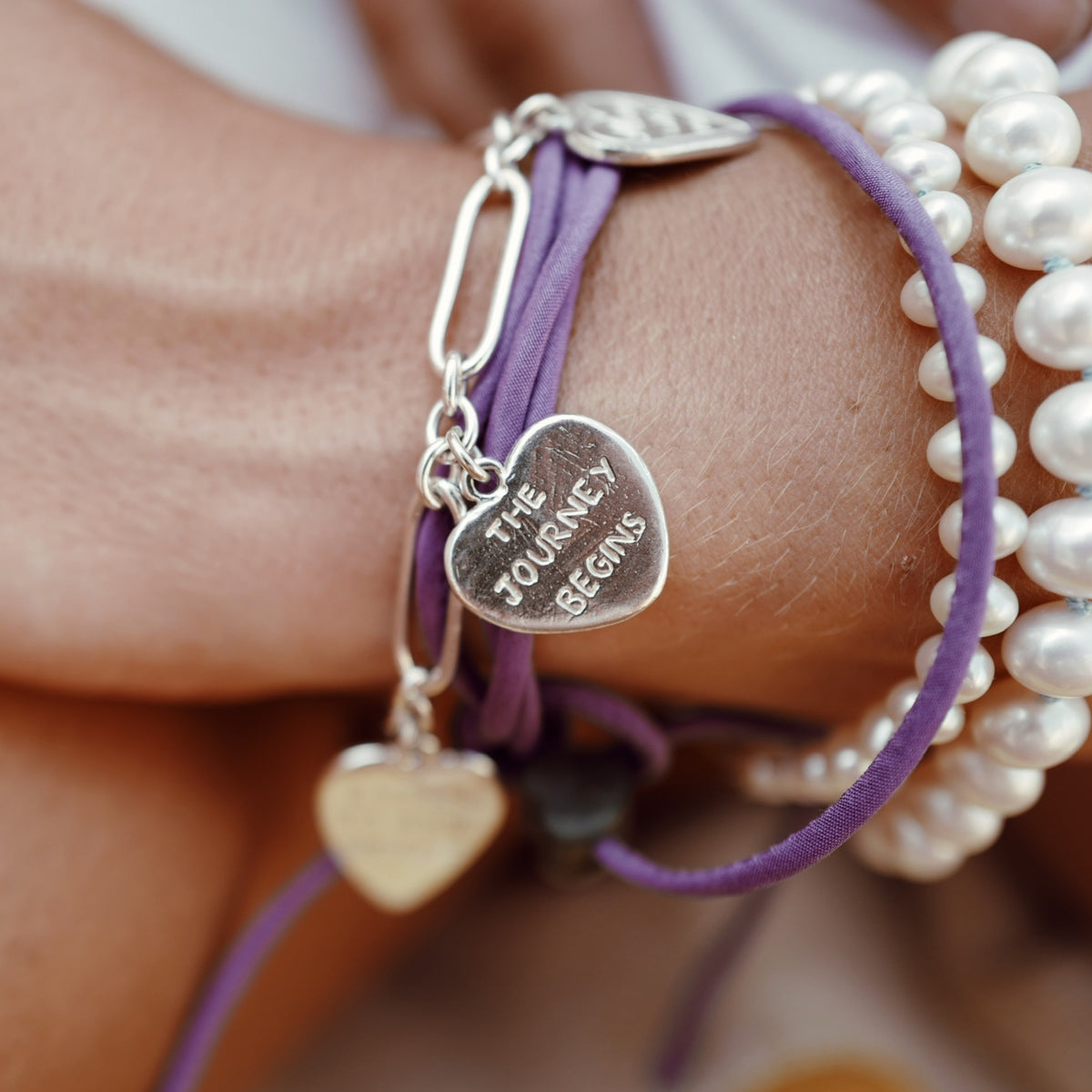 [modelwears Silver Heart Love Token Bracelet] [women]