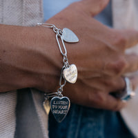 [modelwears Silver Heart Love Token Bracelet] [women]