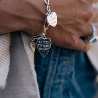 [modelwears Silver Heart Love Token Bracelet] [women]