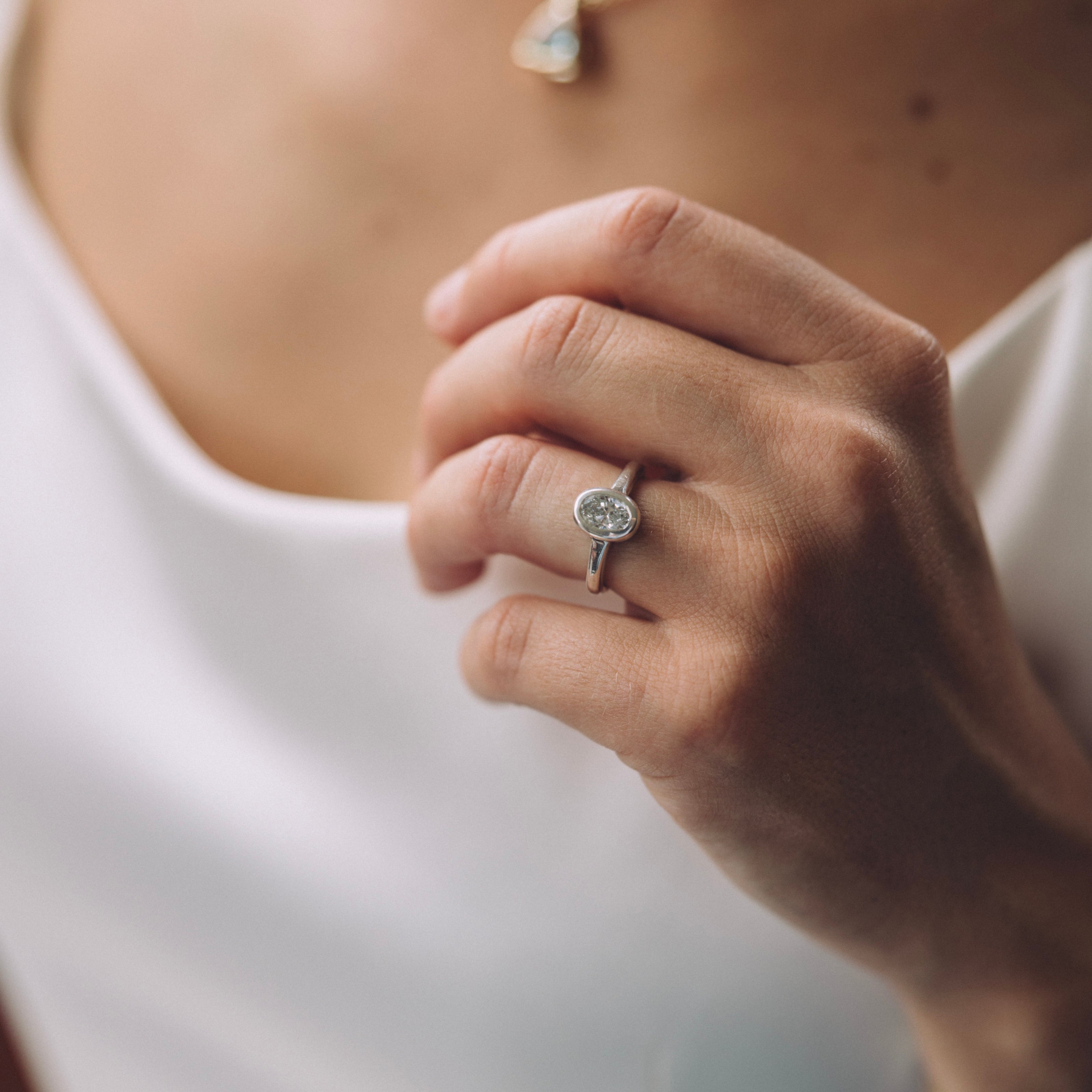 'The Story' Silver Oval 1ct Lab Grown Diamond Bezel Engagement Ring