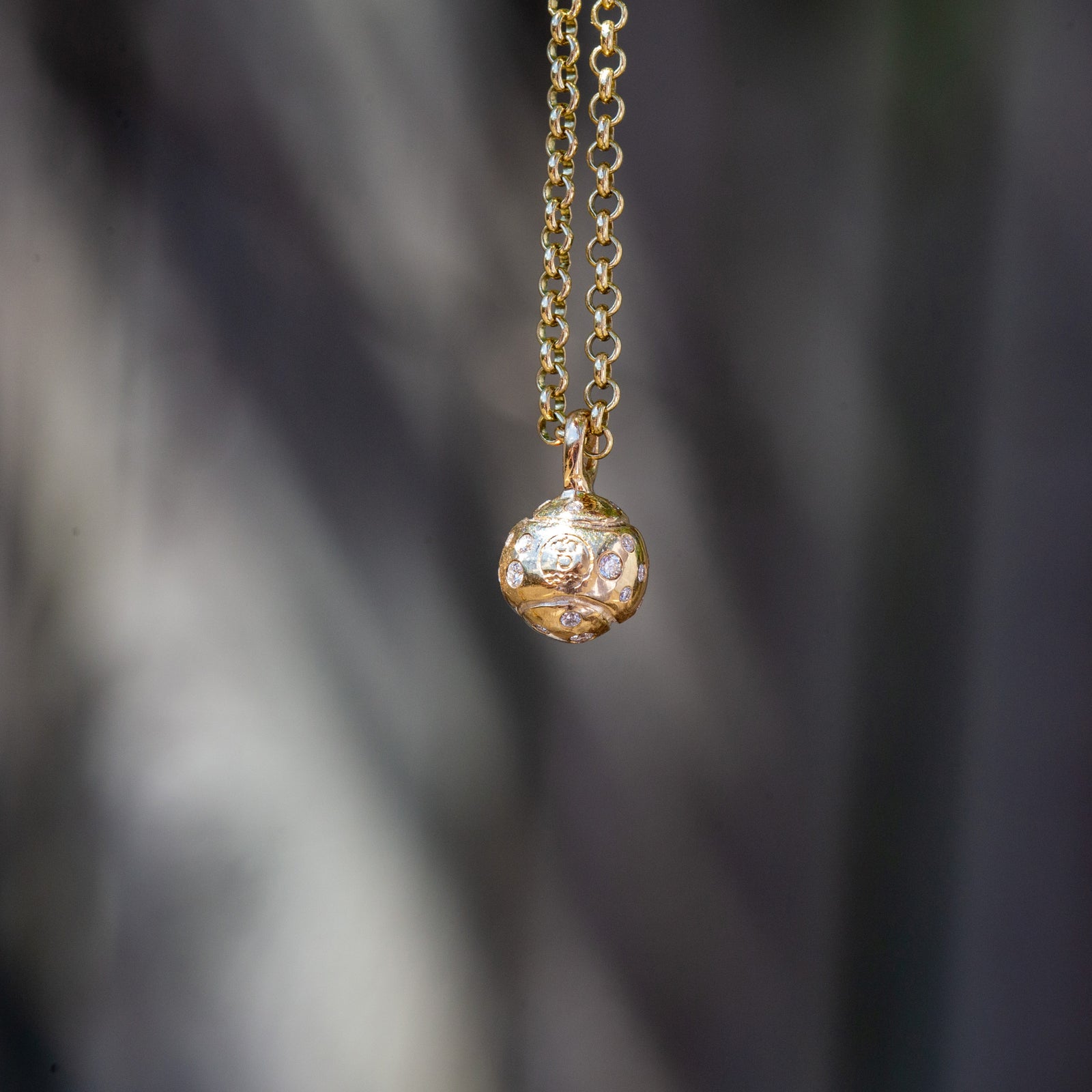 Gold DD Tennis Ball Diamond Necklace