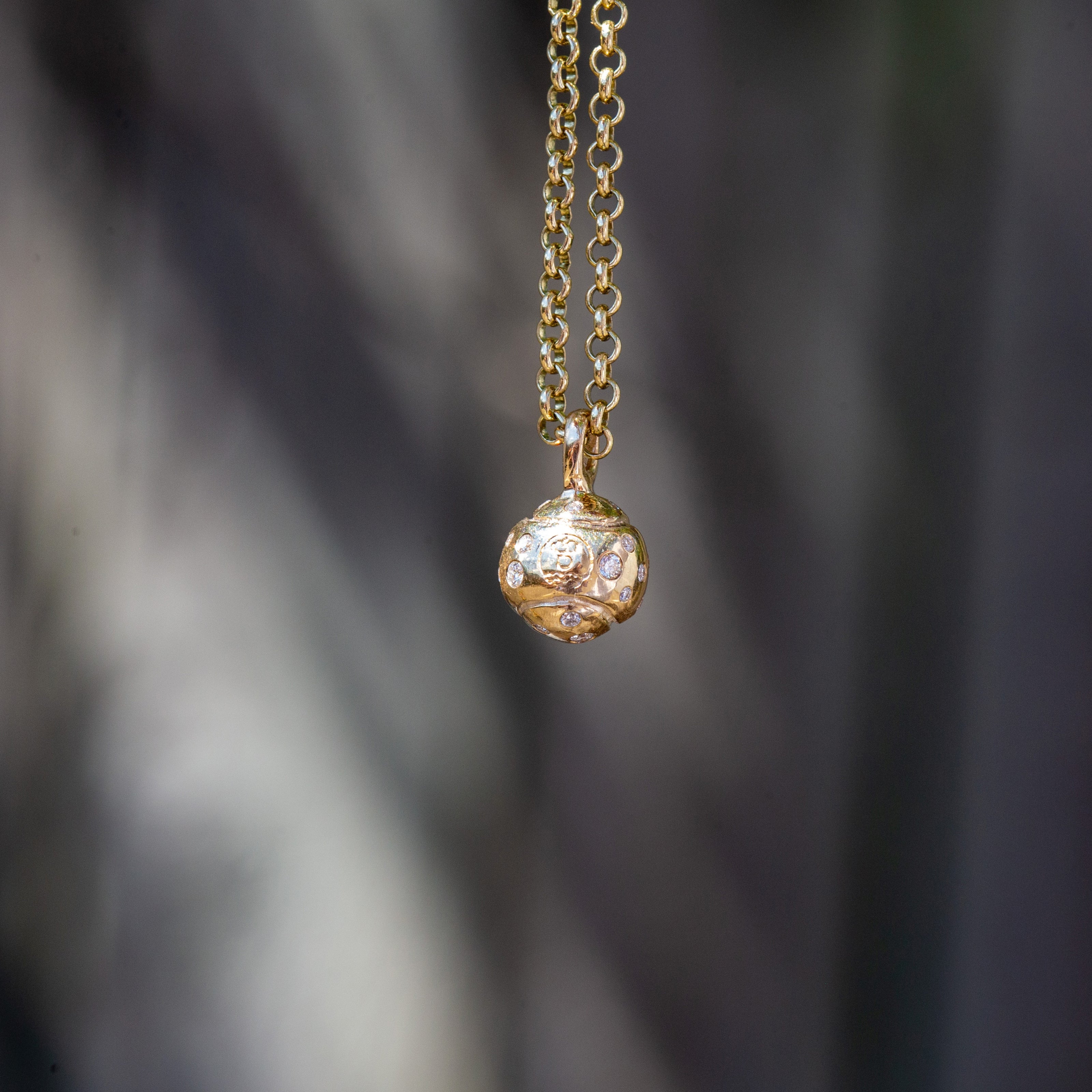 Gold DD Tennis Ball Diamond Necklace