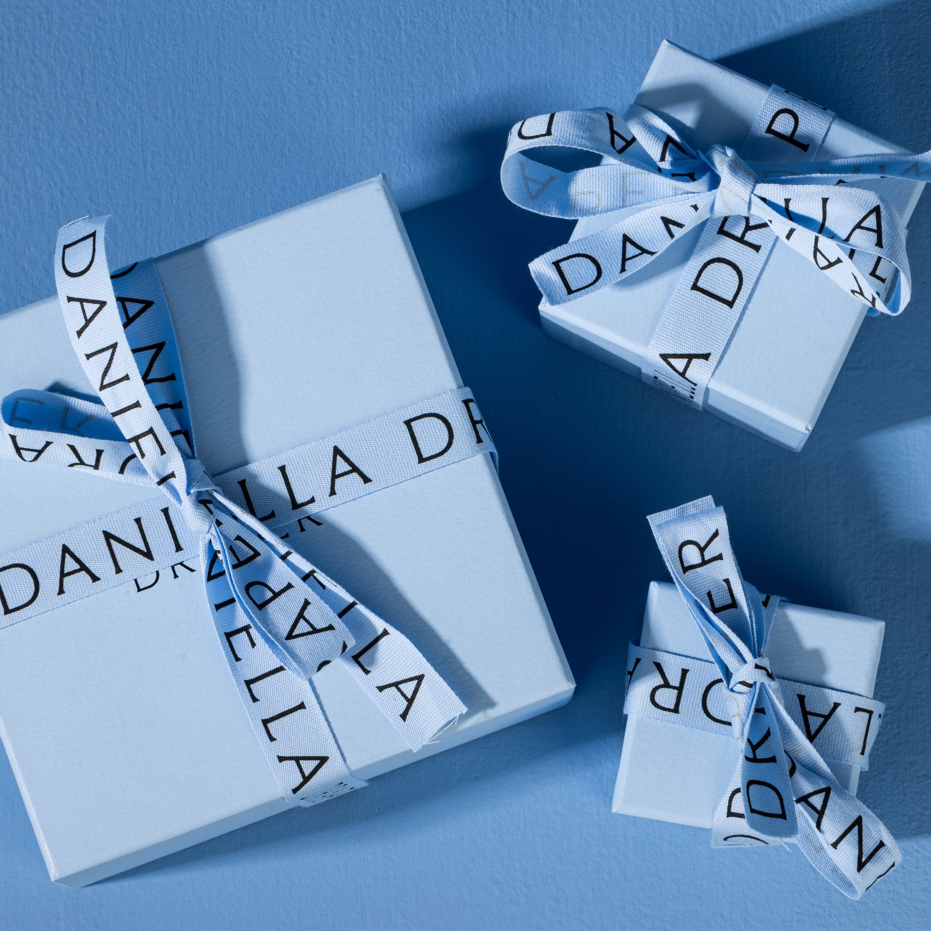 NERIDA Gold Blue Topaz Earrings