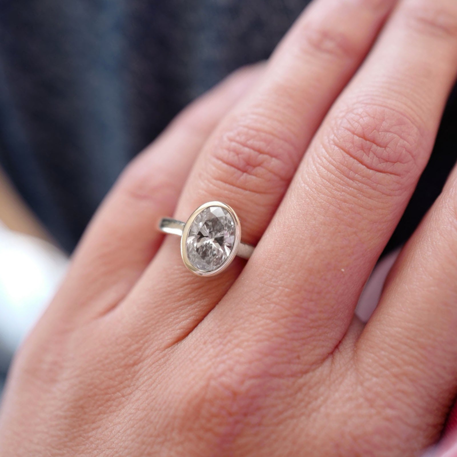 'The Story' Silver Oval 2ct Lab Grown Diamond Bezel Engagement Ring