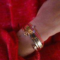 [women][women-hover] [modelwears Bright Pink & Orange Cord Bracelet]