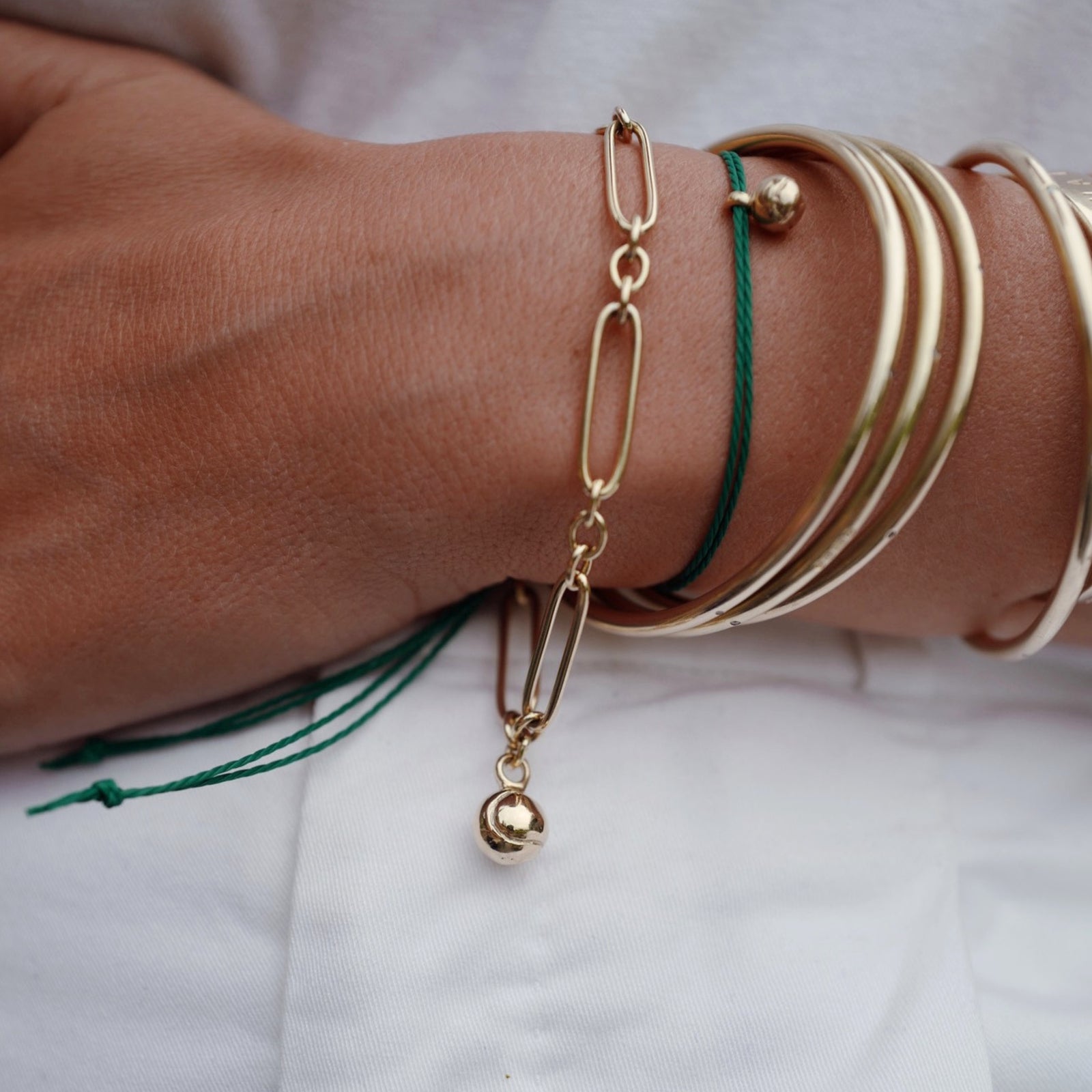 Gold DD Tennis Ball Cord Bracelet