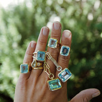 Gold Juno Blue Topaz Split Shank Ring