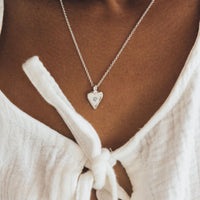 [modelwears Silver Mini Heart Necklace with Diamond Stone]